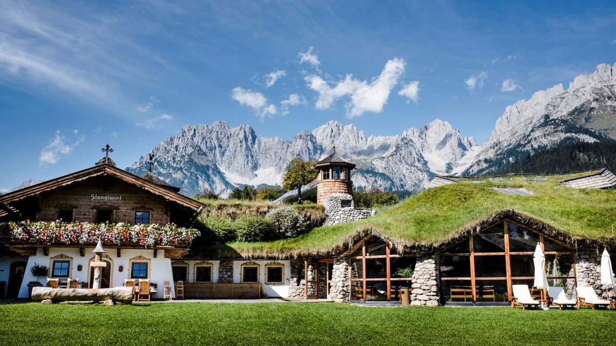 Stanglwirt Resort - Wellnesshotel & Biohotel, Cloud, Sky, Mountain, Building, Plant, Snow, Natural landscape, Highland, Land lot