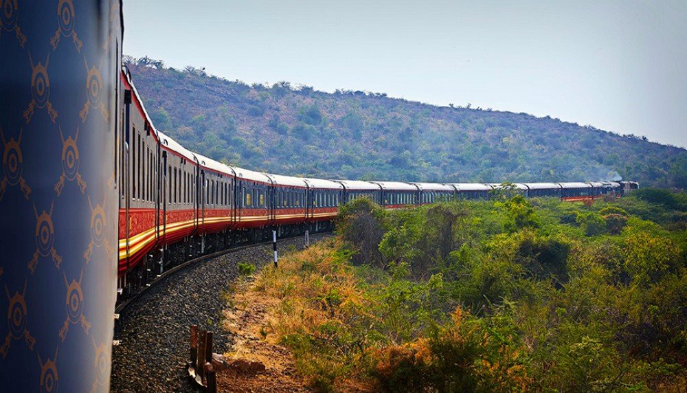 Nature, Train, Sky, Plant, Rolling stock, Tree, Track, Railway, Mountain